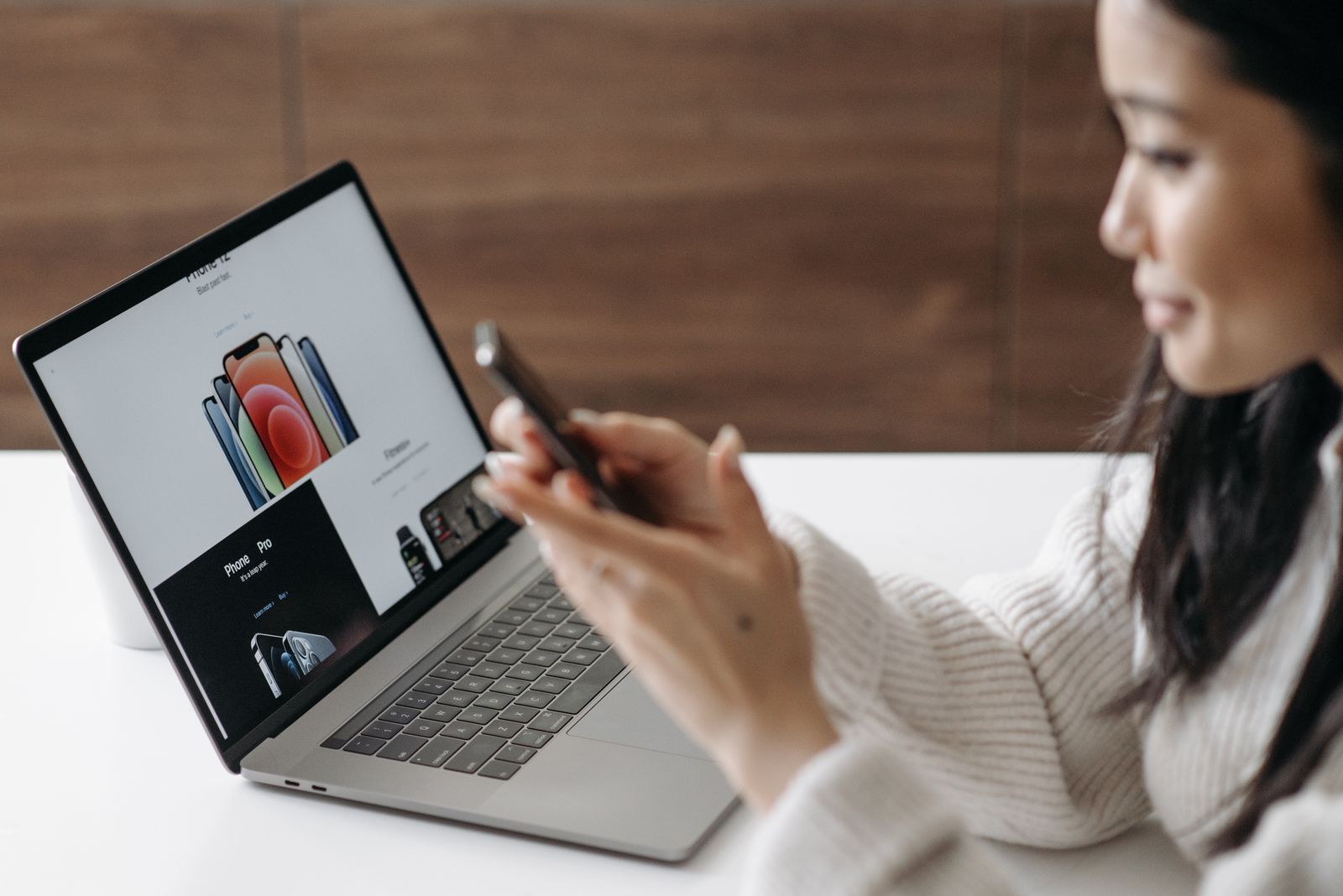 Asian woman completing an online membership purchase